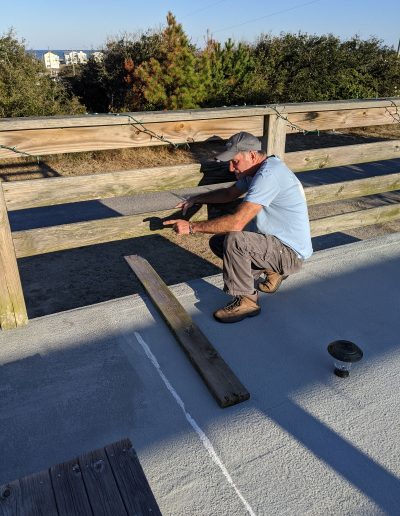 home-inspector-looking-at-deck